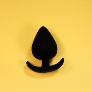 Silicone black spade butt plug with comfort wearable base