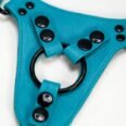 Teal Leather strap-on harnesses with black hardware a white back ground